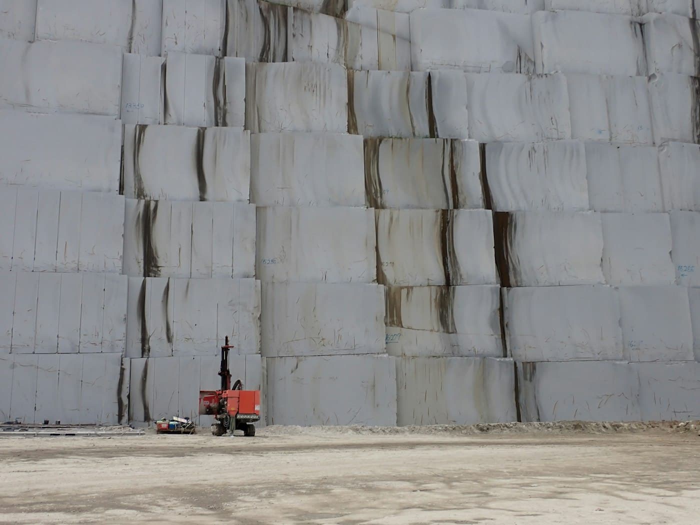 Terraced wall of dimension stone at a quarry face